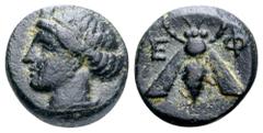 Greek Ionia, Ephesos Æ11. Circa 390-380 BC. Turreted head of Kybele left / Bee; E-Φ across fields. SNG Kayhan 1243; SNG Copenhagen 256. 1.20g, 11mm, 12h. Very Fine. Very Rare; only one other example o
