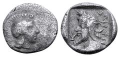 Greek Dynasts of Lycia, Kherei AR Obol. Circa 410-390 BC. Helmeted head of Athena right / Laureate head of bearded dynast left, wearing Persian tiara, monogram before, legend behind; all within incuse