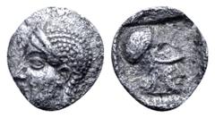 Greek Asia Minor, uncertain mint AR Tetartemorion. Circa 5th century BC. Head left / Helmeted head of Athena right. Unpublished in the standard references, cf. CNG e380, 276 var. (Athena left). 0.15g,