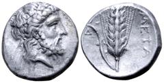 Greek Lucania, Metapontion AR Stater. Circa 333-330 BC. Laureate head of Zeus right, [ΕΛΕΥΘΕΡΙΟΣ] before, [Δ] behind / Ear of barley with leaf to left, upon which Silenos crouches; META to right, [A]Δ