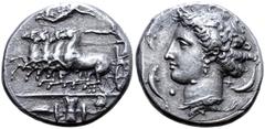 Greek Sicily, Syracuse AR Dekadrachm. Time of Dionysios I, circa 405-370 BC. Unsigned dies in the style of Euainetos. Charioteer driving galloping quadriga to left, holding kentron in right hand, rein