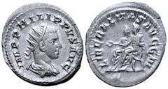 Roman Imperial Philip II AR Antoninianus. Rome, AD 247-249. IMP PHILIPPVS AVG, radiate, draped and cuirassed bust right / LIBERALITAS AVGG III, Philip I and Philip II seated left on curule chairs; Phi