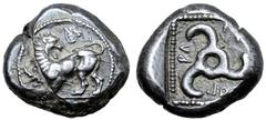 Greek Dynasts of Lycia, Kuprilli AR Stater. Telmessos, circa 480-440 BC. Lion standing left, head turned / Tetraskeles, [K]OΠPΛΛ[E] around, [ivy leaf] above, all within dotted border within incuse squ