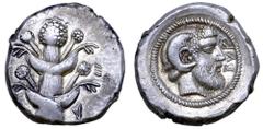 Greek Kyrenaika, Kyrene AR Tetradrachm. Circa 450-420 BC. Silphium plant with two pairs of leaves and five umbels; at base of stem, two tiny leave to [left] and right / Head of Zeus Ammon to right, ha
