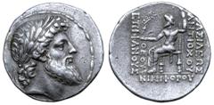Greek Seleukid Empire, Antiochos IV Epiphanes AR Tetradrachm. Antioch, circa 168-164 BC. Laureate head of Zeus right, with the features of Antiochos / Zeus Nikephoros seated left, with Nike standing r