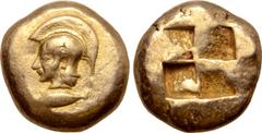 Greek Mysia, Kyzikos EL Stater. Circa 550-500 BC. Head of Athena left, wearing crested Attic helmet, base of crest decorated with zig-zag and pellet pattern; tunny to left below / Quadripartite incuse