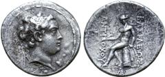 Greek Seleukid Empire, Antiochos the son of Seleukos IV AR Tetradrachm. Antioch, circa 175 BC. Diademed head right / Apollo Delphios seated left on omphalos, holding arrow and resting on hand on bow; 