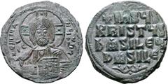 Byzantine Anonymous Æ 40 Nummi. Time of Basil II and Constantine VIII. Constantinople, circa 976-1025. Facing nimbus bust of Christ, holding Gospels /+IhSЧS XRISTЧS bASILЄЧ bASILЄ in four lines. DOC C