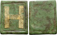 Byzantine Byzantine Empire Æ Three Nomisma Coin Weight. Circa 5th-7th Century AD. H within linear border / Blank. 12.54g, 30mm x 25mm. An attractive rectangular coin weight with a well-preserved gold 