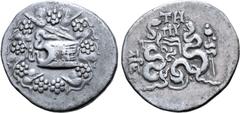 Greek Mysia, Pergamon AR Cistophoric Tetradrachm. Circa 76-67 BC. Serpent emerging from cista mystica; all within ivy wreath / Two serpents entwined around bow and bowcase; TH and monogram above, civi