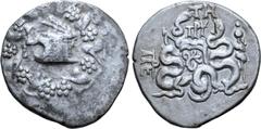 Greek Mysia, Pergamon AR Cistophoric Tetradrachm. Circa 76-67 BC. Serpent emerging from cista mystica; all within ivy wreath / Two serpents entwined around bow and bowcase; TH and monogram above, civi