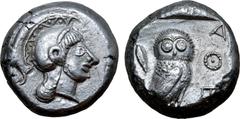 Greek Attica, Athens AR Tetradrachm. Circa 556-546 BC. Archaic head of Athena right, wearing crested helmet decorated with chevron and dot pattern / Owl standing to right with head facing, olive sprig