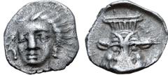 Greek Cilicia, uncertain mint AR Obol. Circa 5th-4th centuries BC. Female head facing slight left, circle of dots around / Head of Bes facing, within shallow incuse. SNG Levante 233; SNG France 486; M