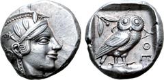 Greek Attica, Athens AR Tetradrachm. Circa 454-404 BC. Head of Athena right, wearing crested Attic helmet ornamented with three olive leaves above visor and spiral palmette on bowl, round earring with
