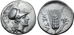 Greek Lucania, Metapontion AR Half Shekel. Punic occupation, circa 215-207 BC. Head of Athena to right wearing crested Corinthian helmet / Ear of barley with leaf to right; owl in flight above leaf, M