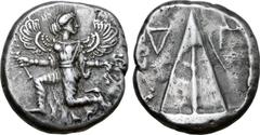 Greek Karia, Kaunos AR Stater. Circa 430-410 BC. Iris running to left, head turned back to right, holding kerykeion in right hand and wreath in left / Triangular baetyl, inverted Δ and Γ across upper 