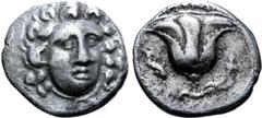 Greek Rhodos, Rhodes AR Drachm. Circa 305-275 BC. Head of Helios facing slightly right / Rose with bud to right; [ΔHMOKΛHΣ](?) above, dolphin to left. BMC 200; HGC 6, 1444 var. (magistrate not listed)