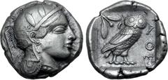 Greek Attica, Athens AR Tetradrachm. Circa 454-440 BC. Late "transitional" issue. Head of Athena right, wearing crested Attic helmet ornamented with three olive leaves above visor and spiral palmette 