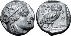 Greek Attica, Athens AR Tetradrachm. Circa 454-440 BC. Late "transitional" issue. Head of Athena right, wearing crested Attic helmet ornamented with three olive leaves above visor and spiral palmette 