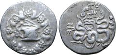 Greek Mysia, Pergamon AR Cistophoric Tetradrachm. Circa 76-67 BC. Serpent emerging from cista mystica; all within ivy wreath / Two serpents entwined around bow and bowcase; TH and monogram above, civi