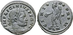 Roman Imperial Licinius I BI Nummus. London, circa AD 311-312. IMP LICINIVS P F AVG, laureate and cuirassed bust right / GENIO POP ROM, Genius standing left, holding patera and cornucopiae, lions skin