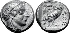 GREEK Attica, Athens AR Tetradrachm. Circa 454-404 BC. Late "transitional" issue. Head of Athena right, wearing crested Attic helmet ornamented with three olive leaves above visor and spiral palmette 