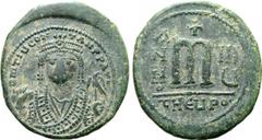 BYZANTINE Maurice Tiberius Æ Nummus. In the name of Tiberius II. Theoupolis (Antioch), dated RY 8 = AD 589/90. D ᙏ TIb CONTAN P P AVG, crowned facing bust, wearing consular robes, holding mappa and ea