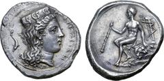 Greek Sicily, Thermai Himerensis AR Didrachm. Circa 365-350 BC. Head of Hera right, wearing stephane ornamented with foreparts of three griffins to right; dolphin behind, ΘERMITAN around / Youthful He