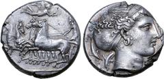 Greek Sicily, Syracuse AR Tetradrachm. Time of the Second Democracy, circa 415-405 BC. Charioteer, holding kentron in right hand and reins in both, driving fast quadriga to left; Nike flying above to 