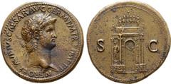 Roman Imperial Nero Æ Sestertius. Rome, AD 64. NERO CLAVDIVS CAESAR AVG GERM P M TR P IMP P P, laureate bust to right / The garlanded and ornate triumphal Arch of Nero, surmounted by statue of the emp