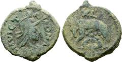 Migration Period Ostrogoths, Municipal Coinage Æ 40 Nummi. Rome, AD 526-534. INVICTA ROMA, draped bust of Roma to right, wearing crested helmet, pendant earring and necklace / She-wolf standing to lef