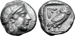 Greek Attica, Athens AR Tetradrachm. Circa 454-404 BC. Late "transitional" issue. Head of Athena right, wearing crested Attic helmet ornamented with three olive leaves above visor and spiral palmette 