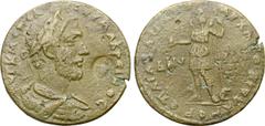 Roman Provincial Macrinus Æ 35mm of Gordus-Julia, Lydia. AD 217-218. Ailios Zosimos, archon. ΑΥΤ Κ Μ ΟΠЄΛ ϹЄΟΥ ΜΑΚΡЄΙΝΟϹ, laureate, draped and cuirassed bust to right; c/m Zeus(?) standing to left, wi