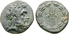 Greek Lydia, Tralleis Æ 18mm. 2nd-1st centuries BC. Laureate head of Zeus to right / ΔIOΣ TPAΛΛIANΩN, winged thunderbolt within wreath. GRPC Lydia 45; SNG Kayhan 1010; SNG Copenhagen-; SNG von Aulock 