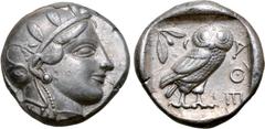 Greek Attica, Athens AR Tetradrachm. Circa 454-404 BC. Late "transitional" issue. Head of Athena to right, wearing crested Attic helmet ornamented with three olive leaves above visor and spiral palmet