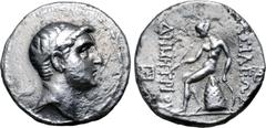 Greek Seleukid Empire, Demetrios I Soter AR Tetradrachm. "Antioch on the Persian Gulf" mint, 162-150 BC. Diademed head to right / Apollo Delphios seated to left on omphalos, testing arrow, and resting