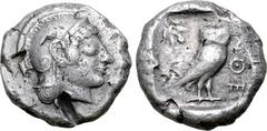 Greek Attica, Athens AR Tetradrachm. Circa 510-500/490 BC. Archaic head of Athena to right, wearing crested Attic helmet decorated with chevron and dot pattern / Owl standing three-quarters to right, 