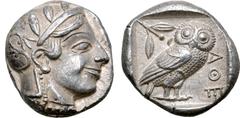Greek Attica, Athens AR Tetradrachm. Circa 454-440 BC. Late "transitional" issue. Head of Athena to right, wearing crested Attic helmet ornamented with three olive leaves above visor and spiral palmet