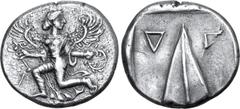 Greek Karia, Kaunos AR Stater. Circa 430-410 BC. Iris running to left, head reverted, holding kerykeion in right hand and wreath in left / Triangular baetyl, inverted Δ and Γ across upper fields; all 