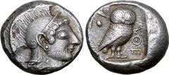 Greek Attica, Athens AR Tetradrachm. Circa 515-500/490 BC. Archaic head of Athena to right, wearing crested Attic helmet decorated with chevron and dot pattern / Owl standing three-quarters to right, 