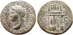 Roman Imperial Nero Æ Sestertius. Lugdunum, circa AD 66. IMP NERO CAESAR AVG PONT MAX TR POT P P, laureate head to left, globe at point of bust / Garlanded triumphal arch surmounted by statue of Nero 