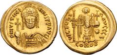 Byzantine Justinian I AV Solidus. Carthage, dated indiction year 10 = AD 546/7. D N IVSTINIANVS P P AVG, helmeted and cuirassed bust facing, holding globus cruciger and shield decorated with horseman 