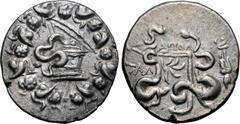 Greek Lydia, Tralleis AR Cistophoric Tetradrachm. Apol-, magistrate. Circa 140-135 BC. Serpent emerging from cista mystica; all within ivy wreath / Two serpents entwined around bow and bowcase; ΑΠΟΛ a