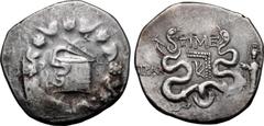 Greek Lydia, Tralleis AR Cistophoric Tetradrachm. Circa 133 BC. Serpent emerging from cista mystica; the whole within wreath / Two serpents entwined around bow and bowcase; TIME above, TPAΛ to left, c