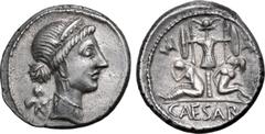 Roman Imperatorial Julius Caesar AR Denarius. Military mint travelling with Caesar in Spain, 46-45 BC. Head of Venus to right, wearing stephane; Cupid behind shoulder / Trophy of Gallic arms between t
