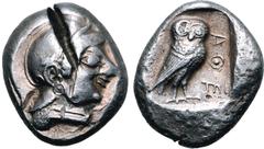 Greek Attica, Athens AR Tetradrachm. Circa 515-500/490 BC. Archaic head of Athena to right, wearing crested Attic helmet decorated with chevron and dot pattern / Owl standing three-quarters to right, 