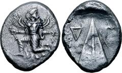 Greek Karia, Kaunos AR Stater. Circa 430-410 BC. Iris running to left, head reverted, holding kerykeion in right hand and wreath in left / Triangular baetyl, inverted Δ and Γ across upper fields; all 