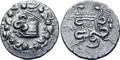 Greek Lydia, Tralleis AR Cistophoric Tetradrachm. Circa 140-135 BC. Apol-, magistrate. Serpent emerging from cista mystica; all within ivy wreath / Two serpents entwined around bow and bowcase; ΑΠΟΛ a