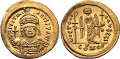 Byzantine Justinian I AV Solidus. Constantinople, AD 545-565. D N IVSTINIANVS P P AVC, helmeted and cuirassed bust facing, holding globus cruciger and shield decorated with horseman motif / VICTORIA A