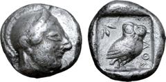 Greek Attica, Athens AR Tetradrachm. Circa 510-500/490 BC. Archaic head of Athena to right, wearing crested Attic helmet decorated with chevron and dot pattern / Owl standing three-quarters to right, 